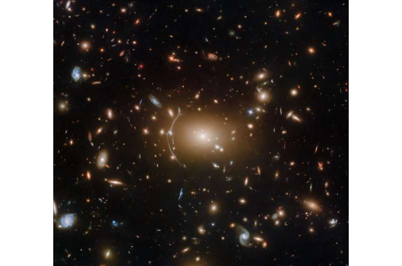 Hubble celebrates the spooky season with Abell 611 — a cobweb of galaxies held together by a dark secret